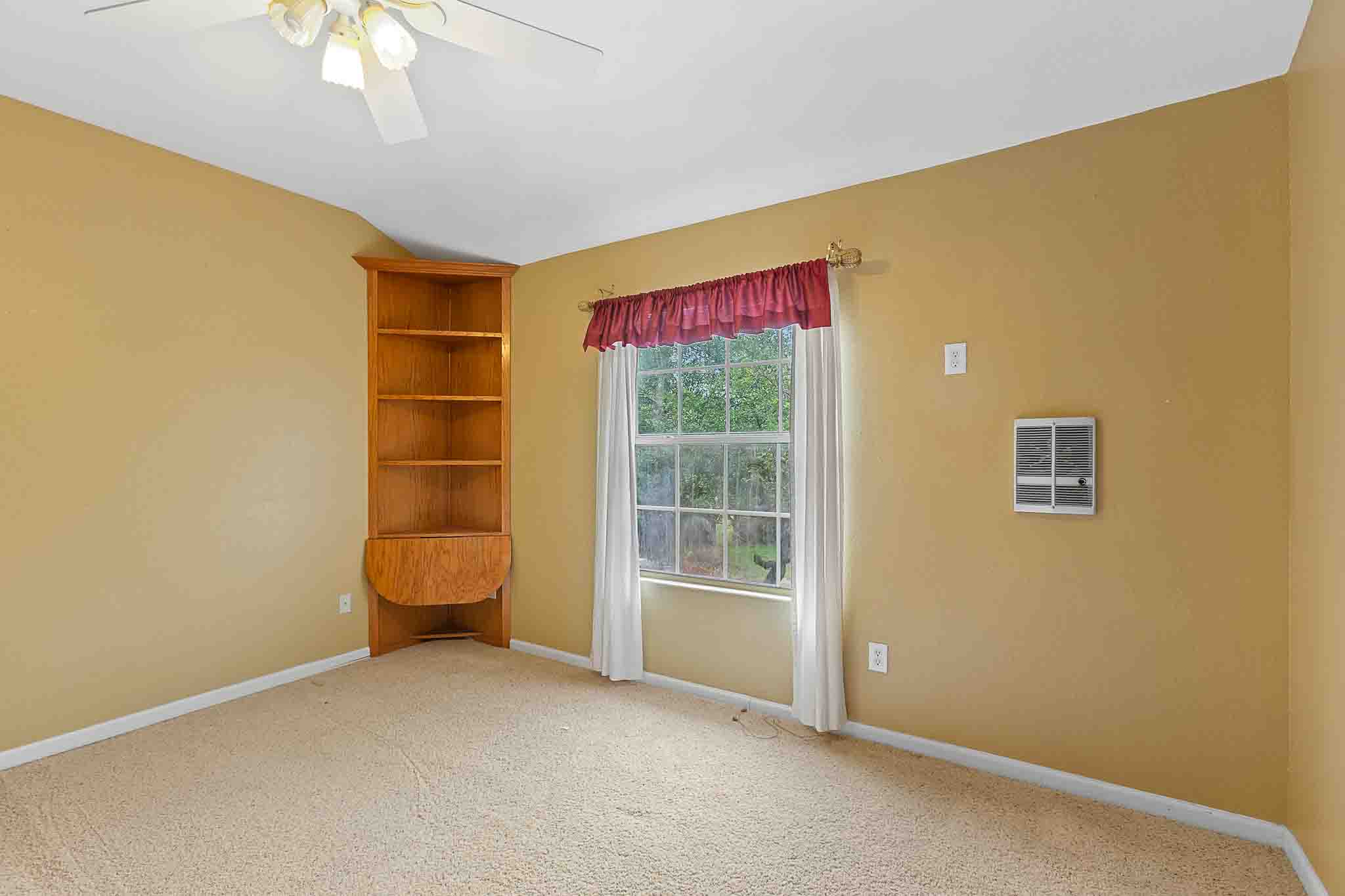 4525 Bell Springs Road Dripping Springs, TX 78620 - Photo 28 of 39 an empty room with a empty space and a window