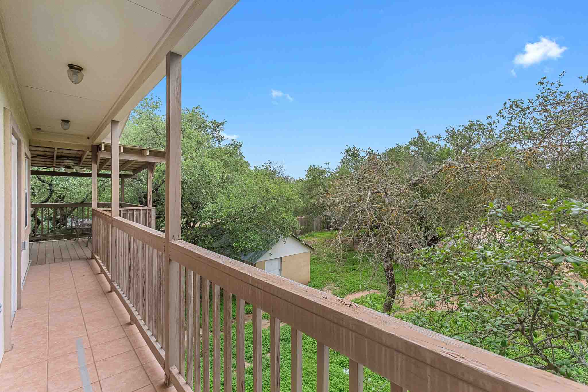 4525 Bell Springs Road Dripping Springs, TX 78620 - Photo 30 of 39 a view of a balcony with an outdoor space