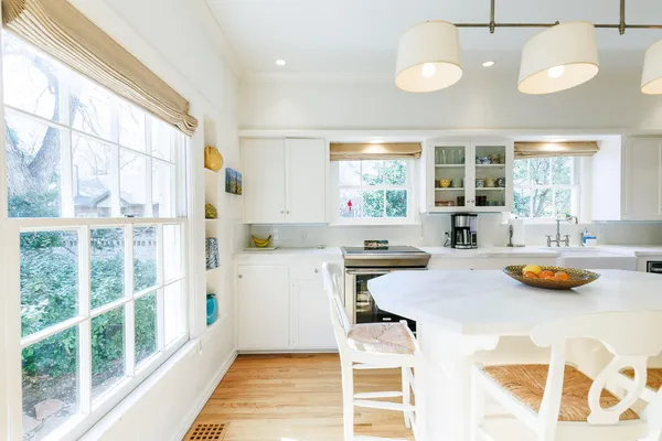 a view of entryway bedroom and hall with wooden floor