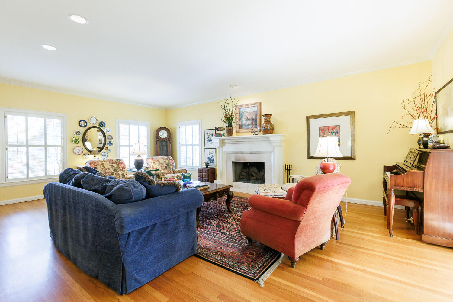 2607 22nd Street Lubbock, TX 79410 - Photo 25 of 87 a living room with furniture a fireplace and a large window