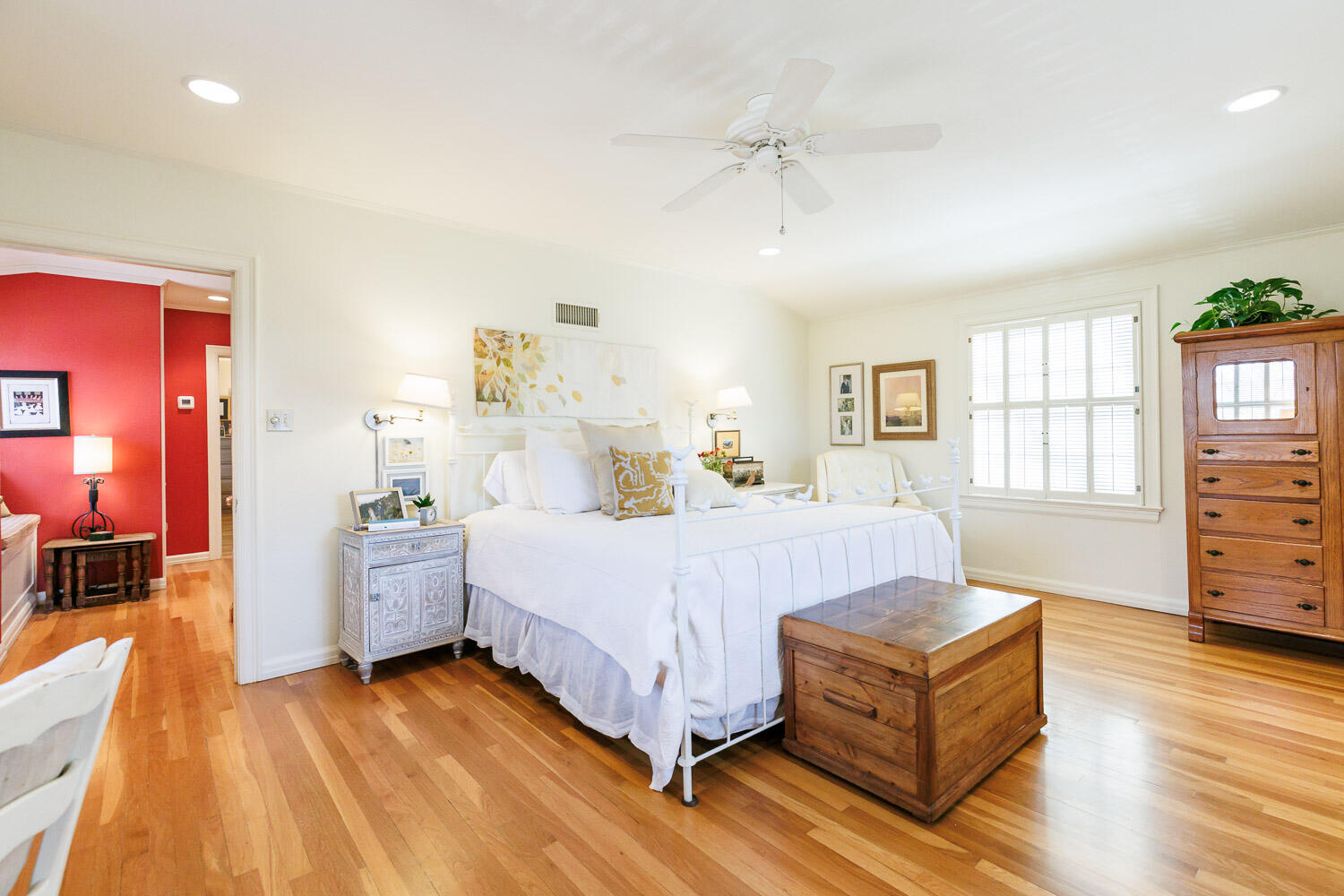 2607 22nd Street Lubbock, TX 79410 - Photo 42 of 87 a spacious bedroom with a bed and wooden floor
