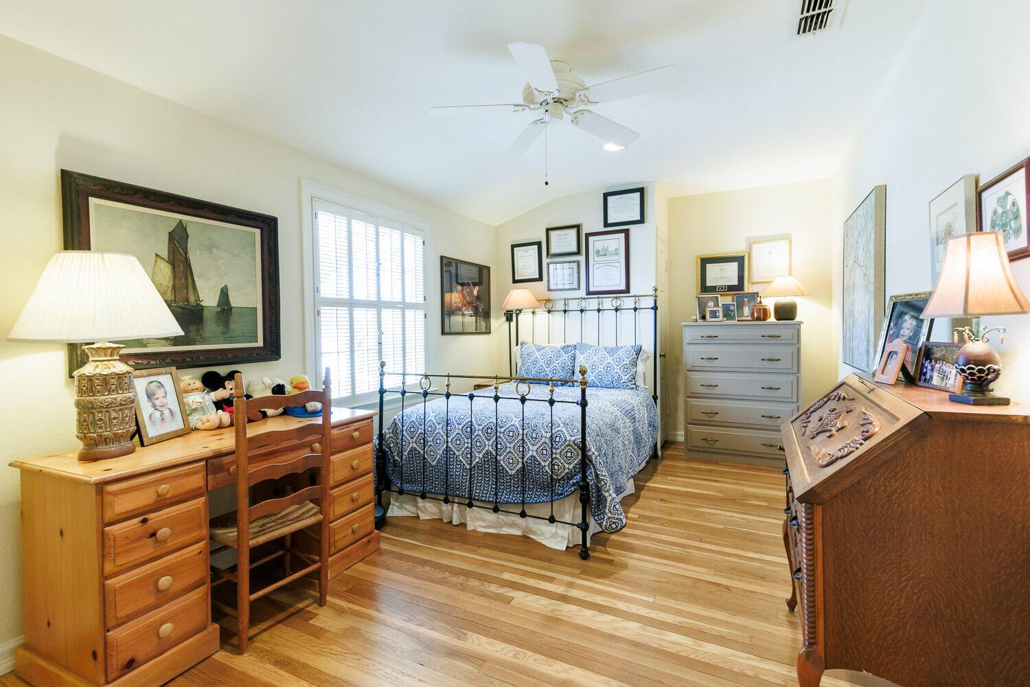 2607 22nd Street Lubbock, TX 79410 - Photo 44 of 87 a bedroom with furniture and a mirror
