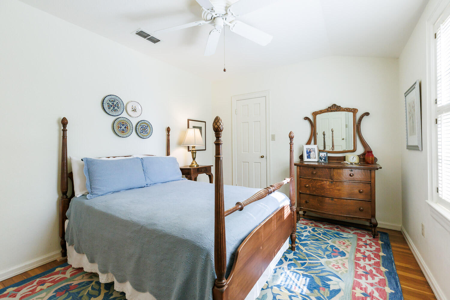 2607 22nd Street Lubbock, TX 79410 - Photo 47 of 87 a bed room with a bed and a table