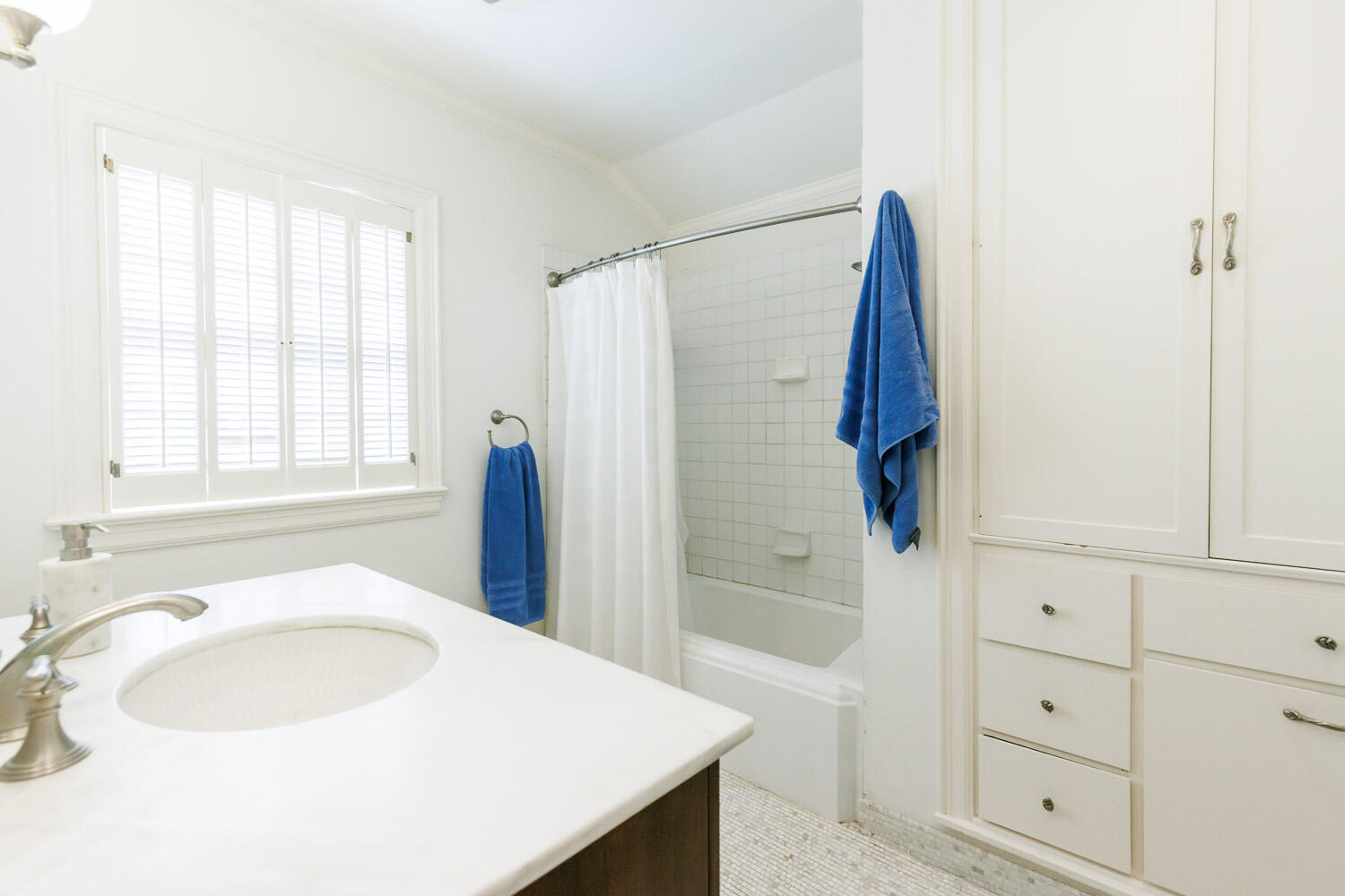 2607 22nd Street Lubbock, TX 79410 - Photo 50 of 87 a bathroom with a sink and a bathtub