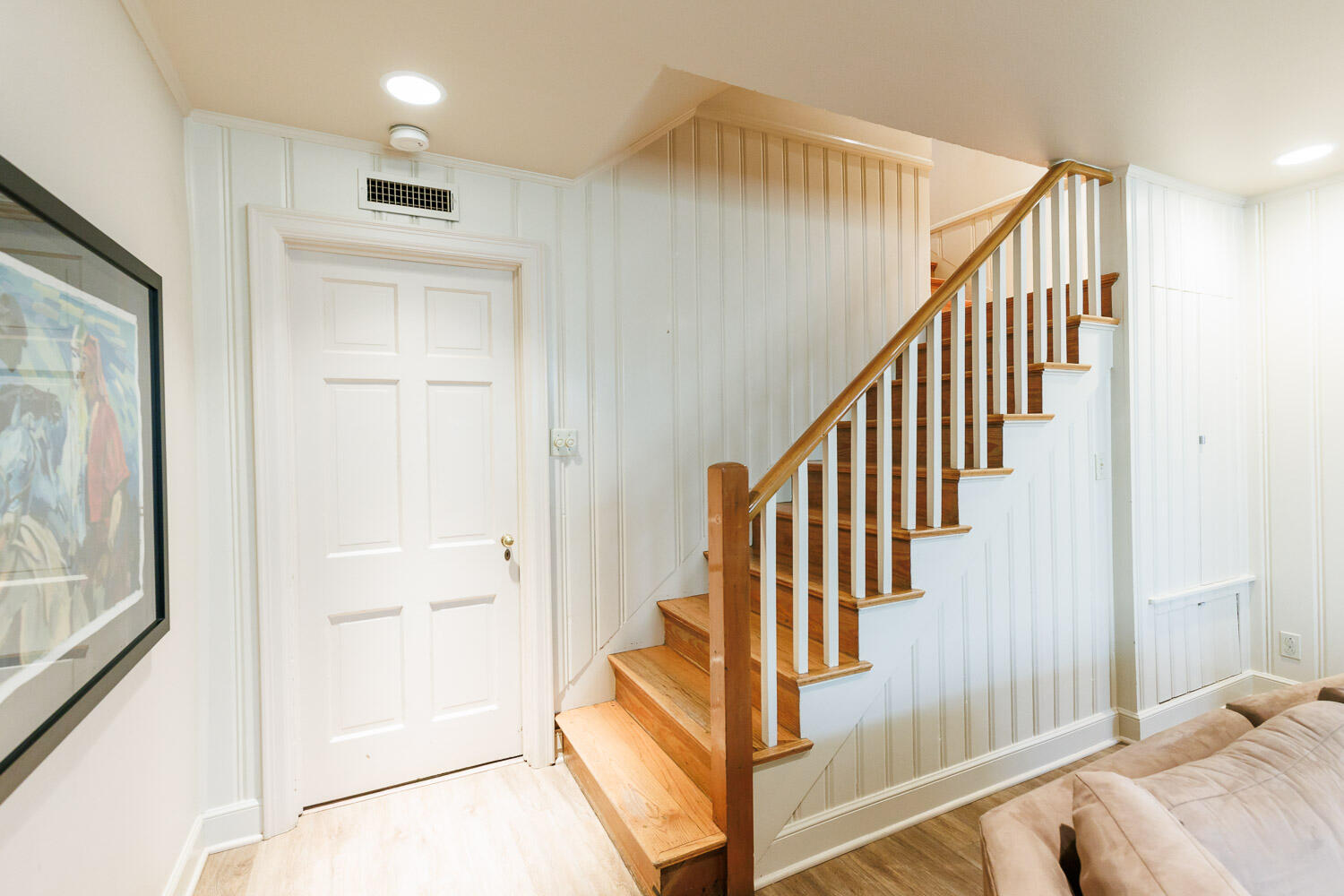 2607 22nd Street Lubbock, TX 79410 - Photo 52 of 87 a view of a hallway with staircase and white walls