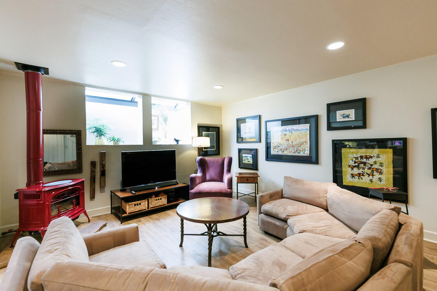 2607 22nd Street Lubbock, TX 79410 - Photo 55 of 87 a living room with furniture and a flat screen tv