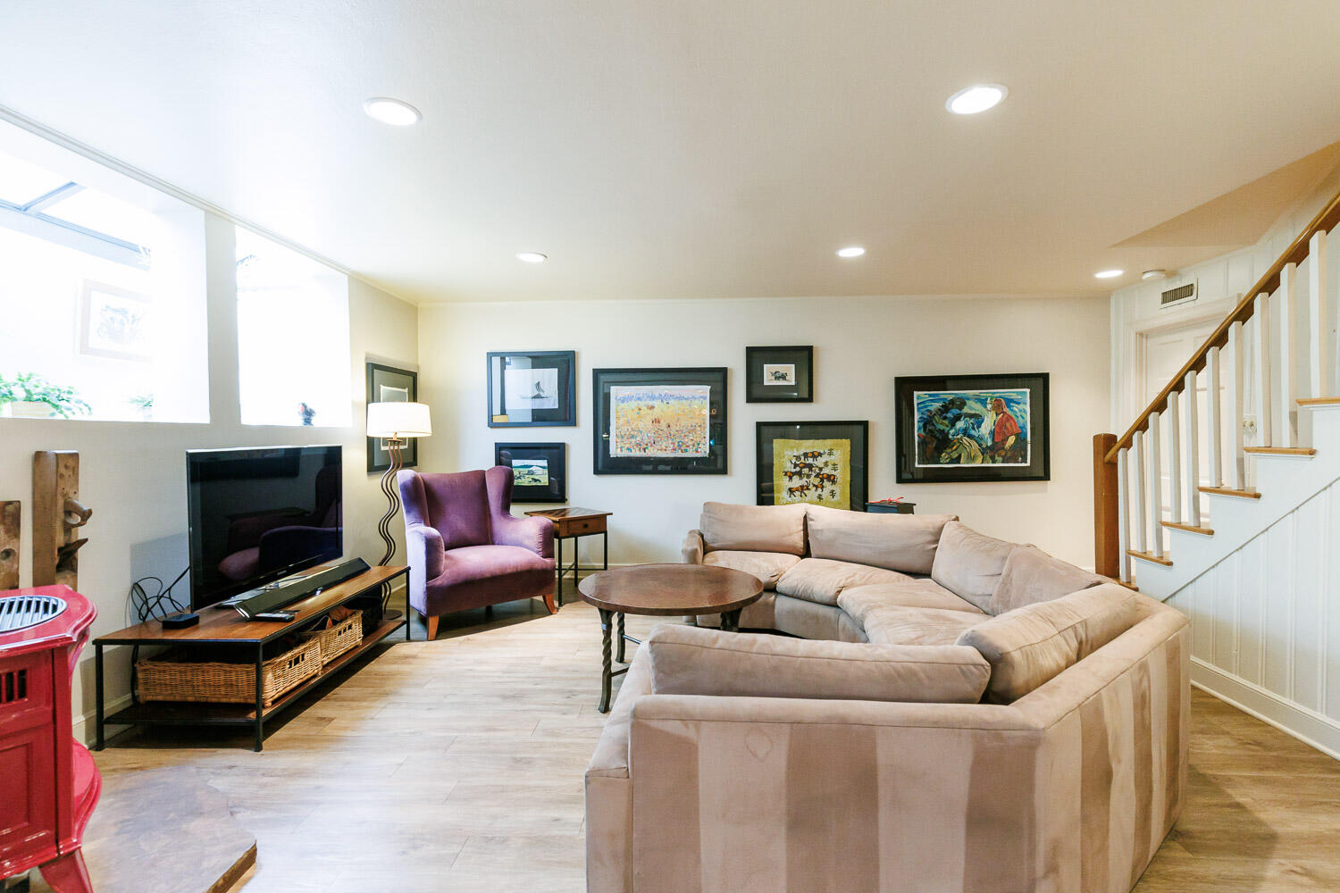 2607 22nd Street Lubbock, TX 79410 - Photo 56 of 87 a living room with furniture and a flat screen tv