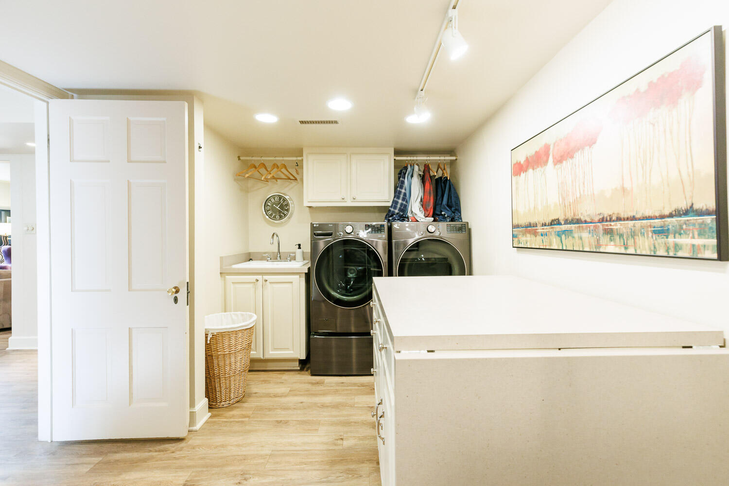 2607 22nd Street Lubbock, TX 79410 - Photo 65 of 87 a view of a storage & utility room with washer and dryer