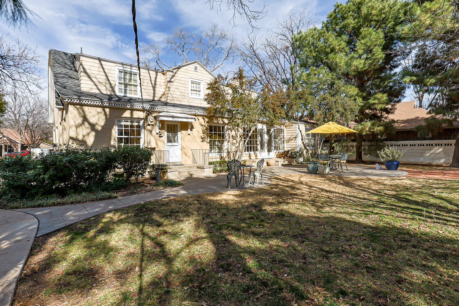 2607 22nd Street Lubbock, TX 79410 - Photo 69 of 87 a swimming pool with outdoor seating and yard