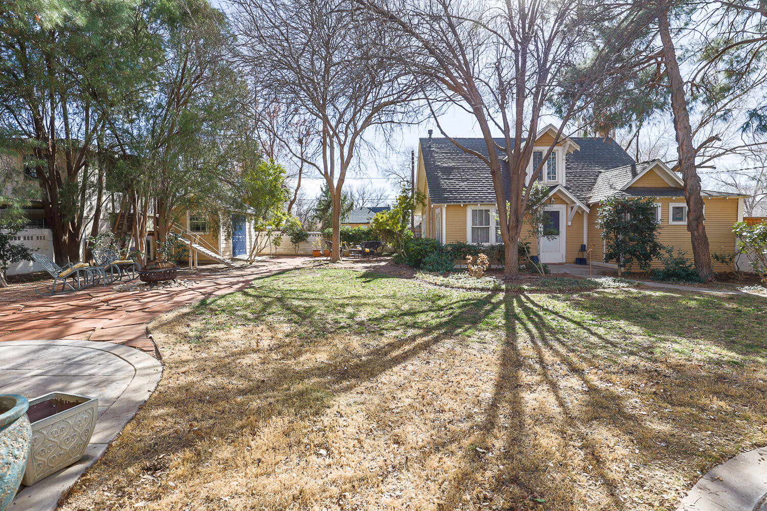 2607 22nd Street Lubbock, TX 79410 - Photo 70 of 87 a view of a white house with a yard covered with snow