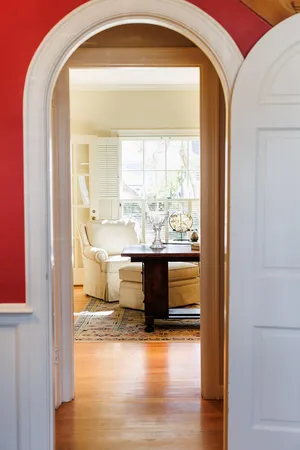 a view of a bathroom with a tub and windows