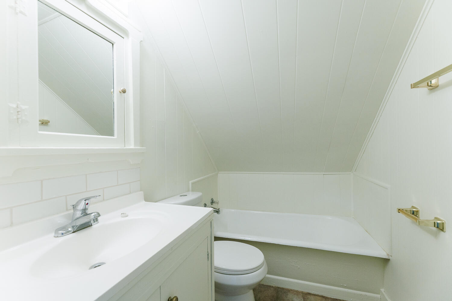 2607 22nd Street Lubbock, TX 79410 - Photo 84 of 87 a bathroom with a sink toilet vanity and tub