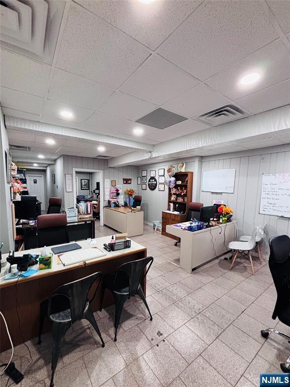 36 Cianci Street Paterson, NJ 07501 - Photo 4 of 9 a living room with furniture kitchen view and a large window