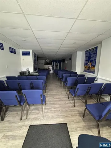 a living room with lots of furniture and a rug