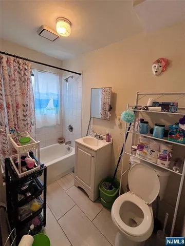 a storage room with washer and dryer