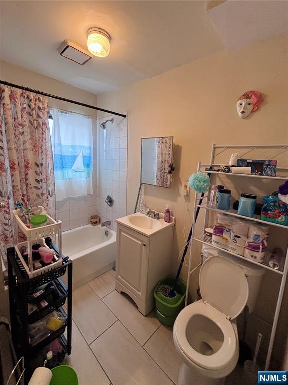 36 Cianci Street Paterson, NJ 07501 - Photo 8 of 9 a storage room with washer and dryer