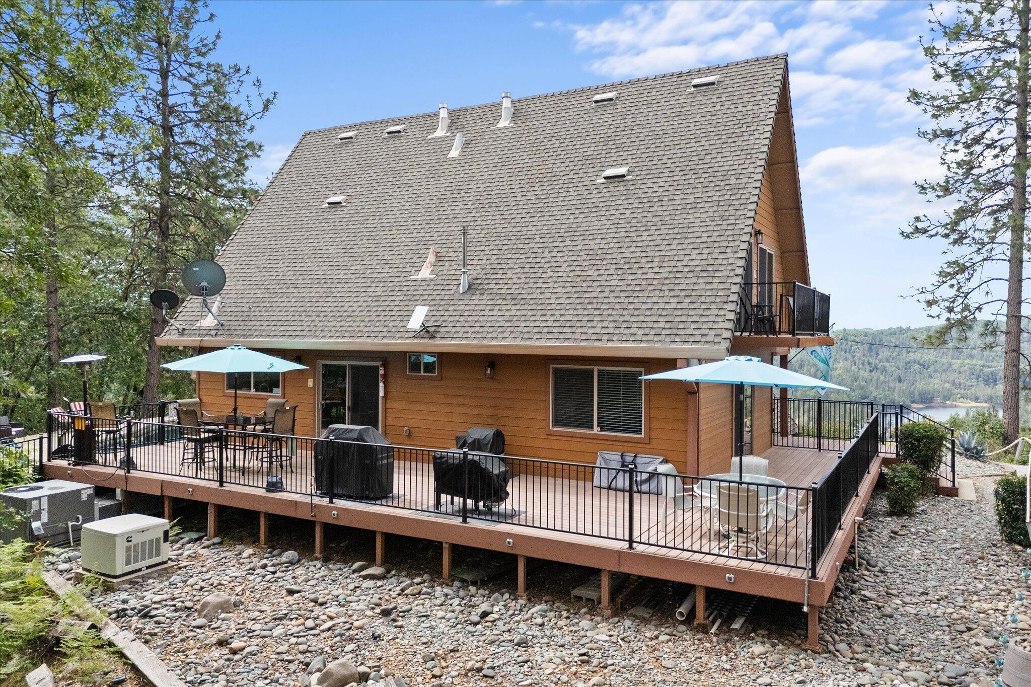 19754 Solus Campground Road Lakehead, CA 96051 - Photo 86 of 94 a view of a patio with couches chairs and wooden fence