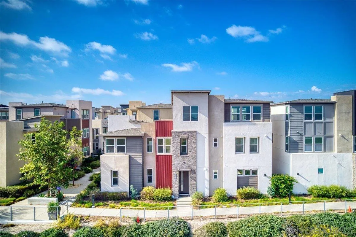 a front view of building with yard