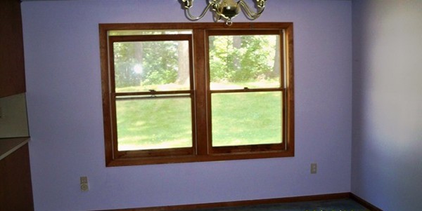 91 Groton School Road Ayer, MA 01432 - Photo 7 of 11 a view of a room that has a window