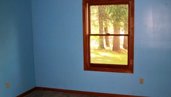 91 Groton School Road Ayer, MA 01432 - Photo 8 of 11 an empty room with a window