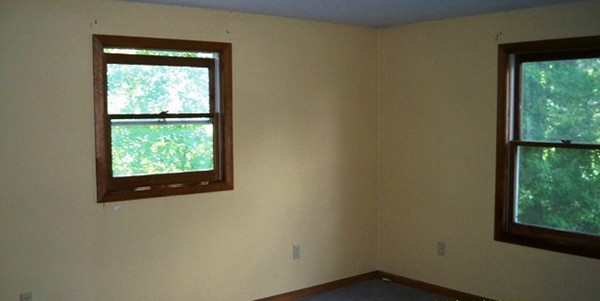 91 Groton School Road Ayer, MA 01432 - Photo 9 of 11 a view of a window in an empty room