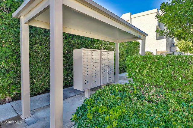 a view of swimming pool with a patio