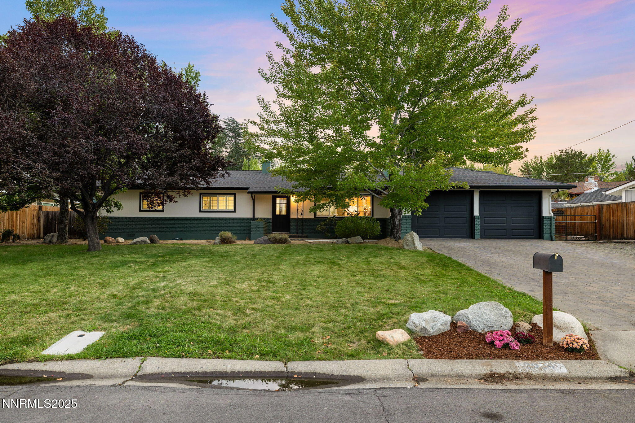 2024 Regent Street Reno, NV 89509 - Photo 1 of 32 a front view of a house with a garden and trees