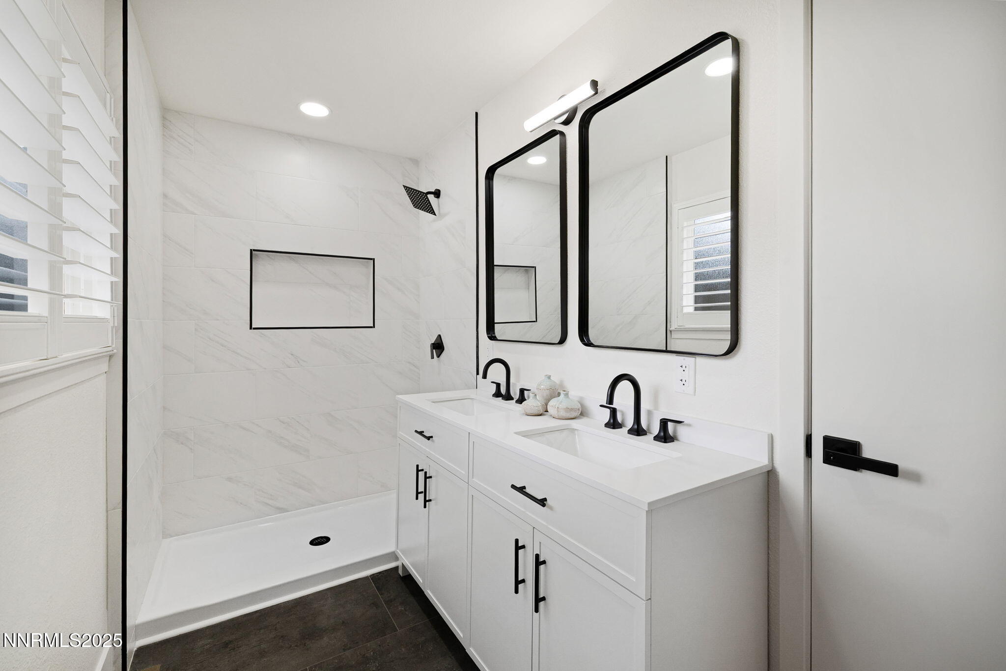 2024 Regent Street Reno, NV 89509 - Photo 17 of 32 a bathroom with a double vanity sink mirror and shower
