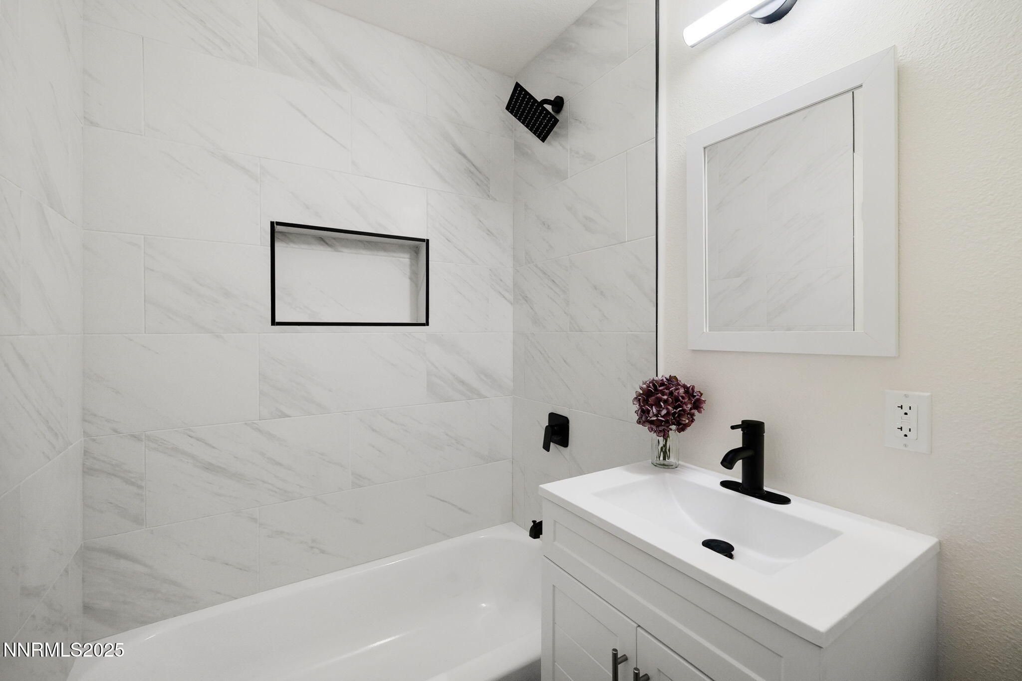 2024 Regent Street Reno, NV 89509 - Photo 20 of 32 a bathroom with a white sink and a bathtub