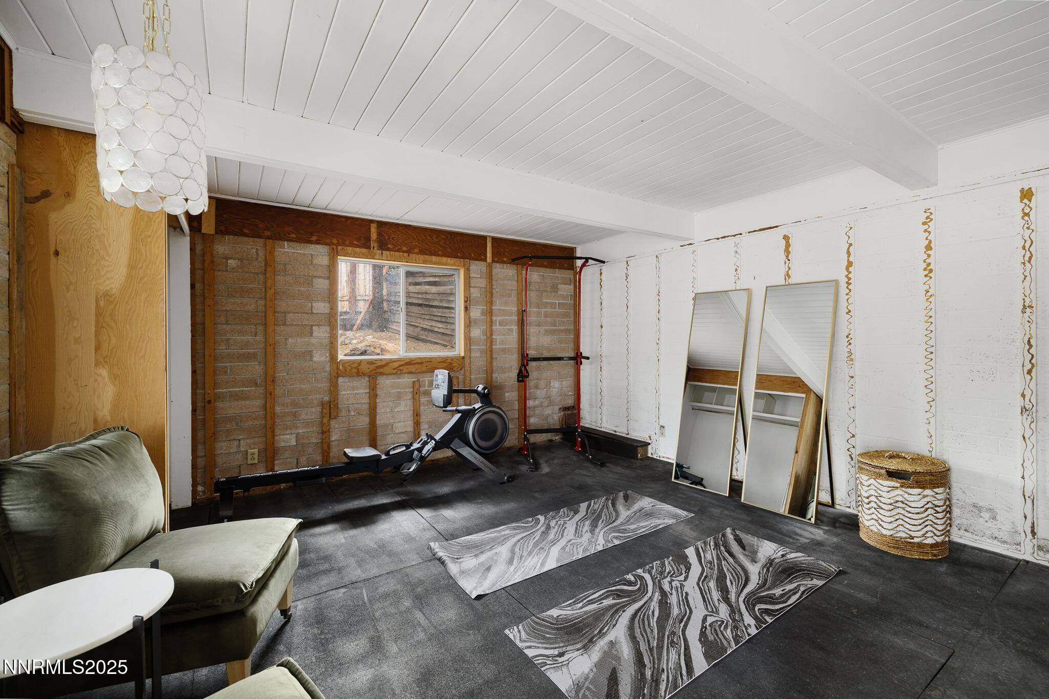 2024 Regent Street Reno, NV 89509 - Photo 25 of 32 a bed room with a bed and a chair