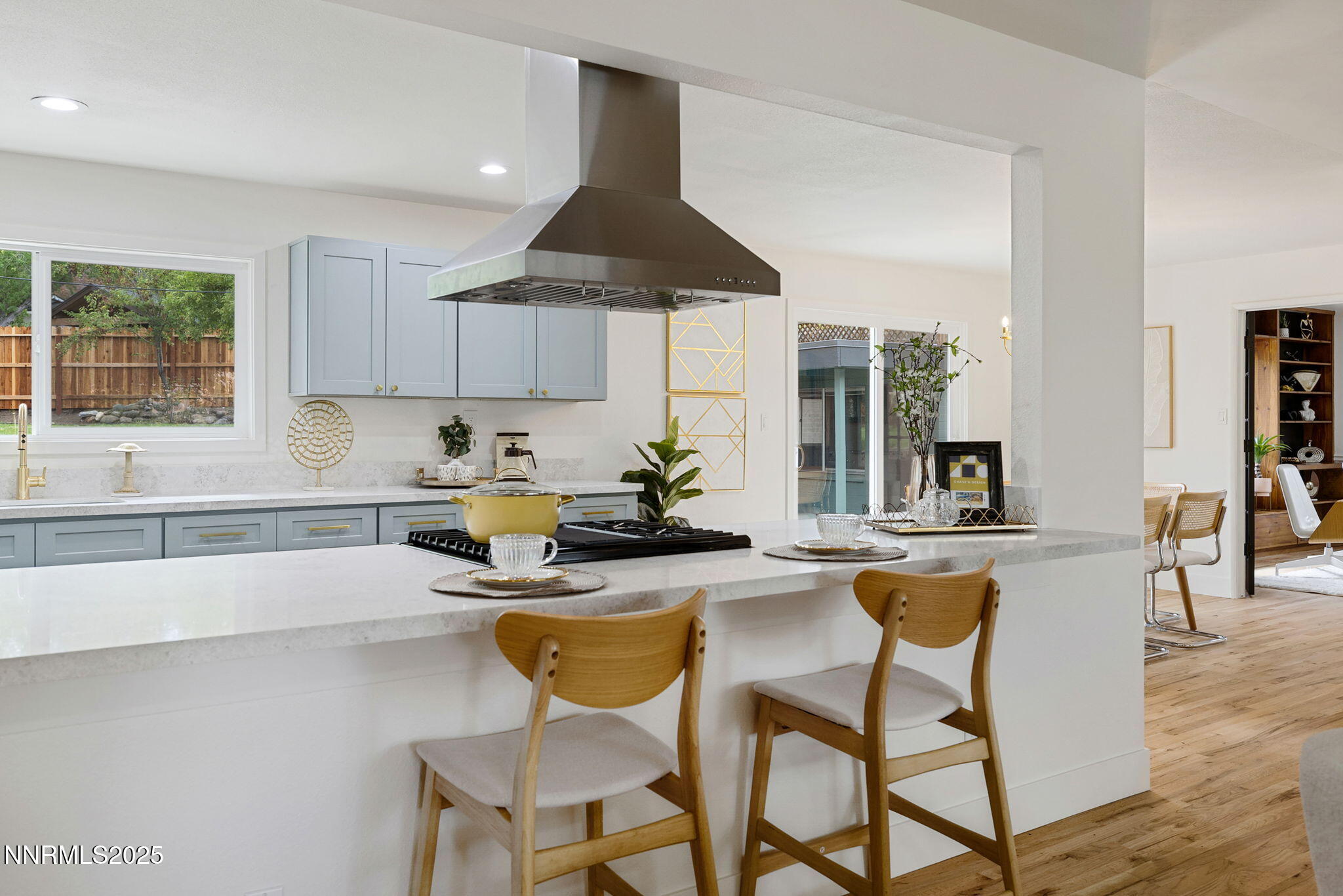 2024 Regent Street Reno, NV 89509 - Photo 8 of 32 a kitchen with a dining table and chairs
