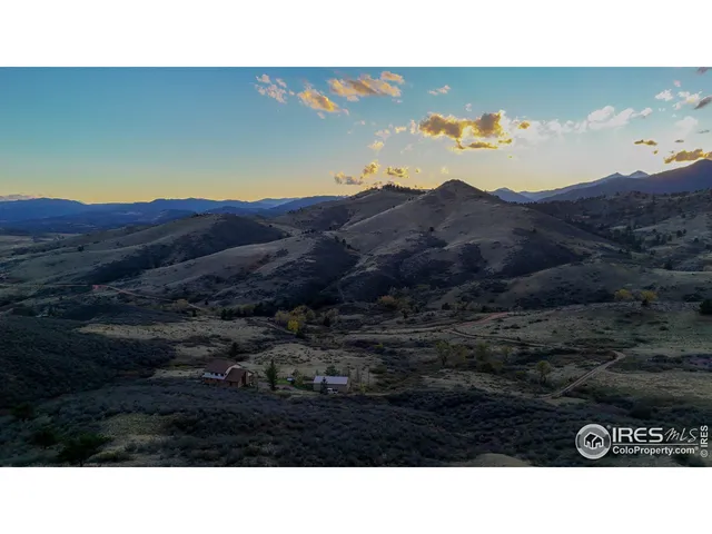 a black and white photo of a sunset