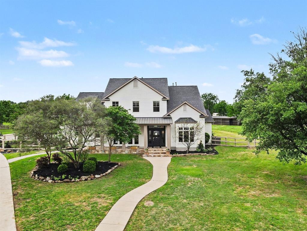 3923 Ranch Estates Circle Plano, TX 75074 - Photo 1 of 32 a view of a house with a big yard potted plants and large tree