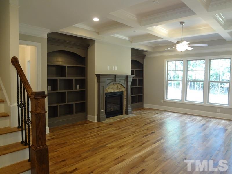 13800 Durant Road Raleigh, NC 27614 - Photo 3 of 25 wooden floor in an empty room with a window