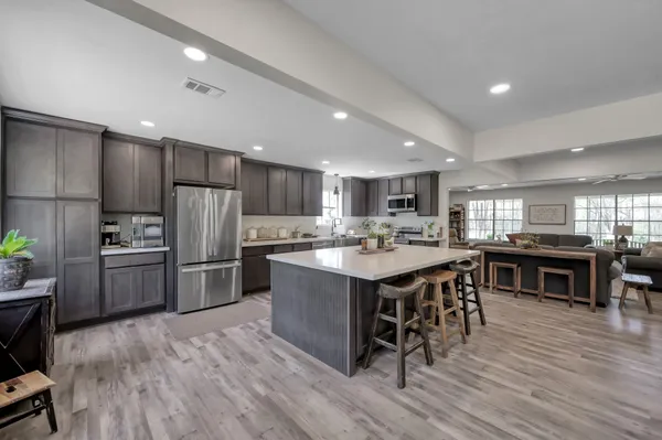 a bathroom with a double vanity sink and mirror