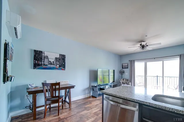a dining room with a table and chairs