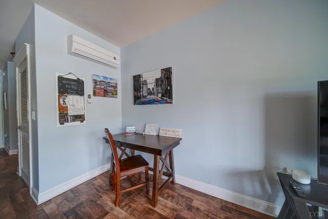 a view of a workspace with furniture