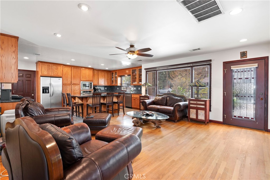 1965 Prince Albert Drive Riverside, CA 92507 - Photo 2 of 38 a living room with furniture and a large window
