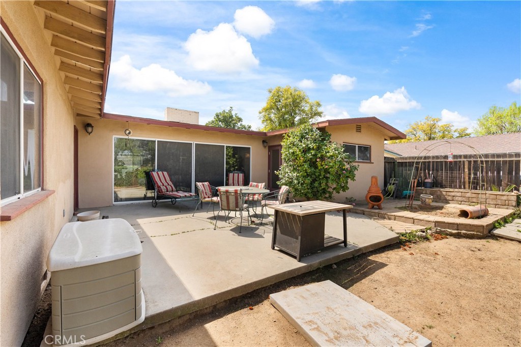 1965 Prince Albert Drive Riverside, CA 92507 - Photo 22 of 38 a view of a house with backyard and sitting area