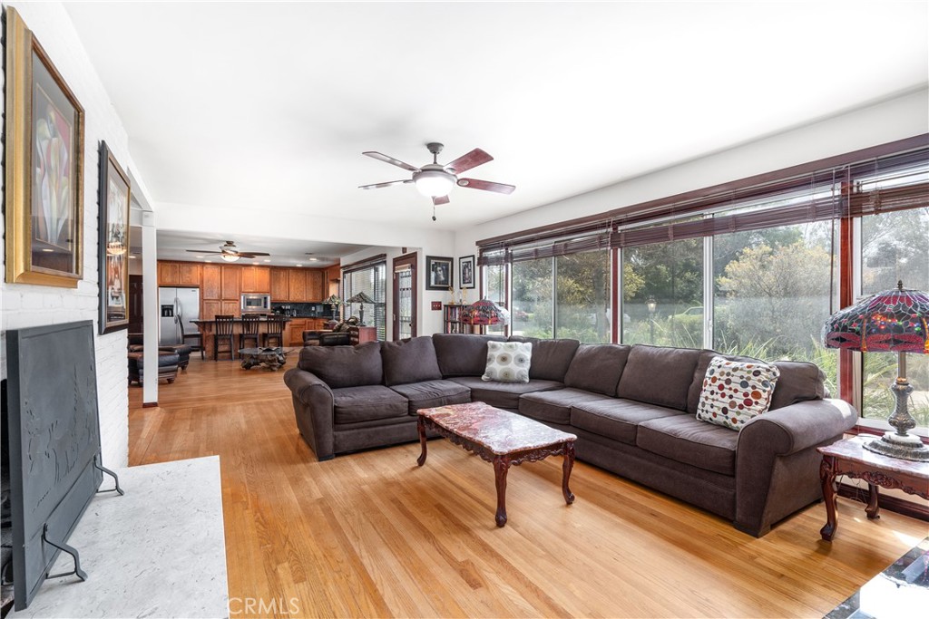 1965 Prince Albert Drive Riverside, CA 92507 - Photo 9 of 38 a living room with furniture and a large window
