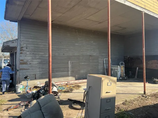 a backyard of a house with lots of green space and lake view