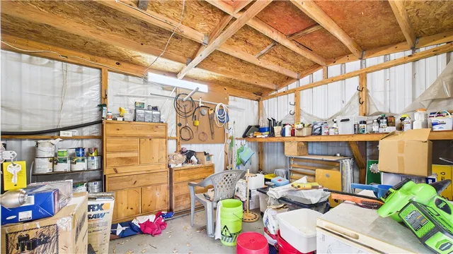 a view of a lake with houses in the back