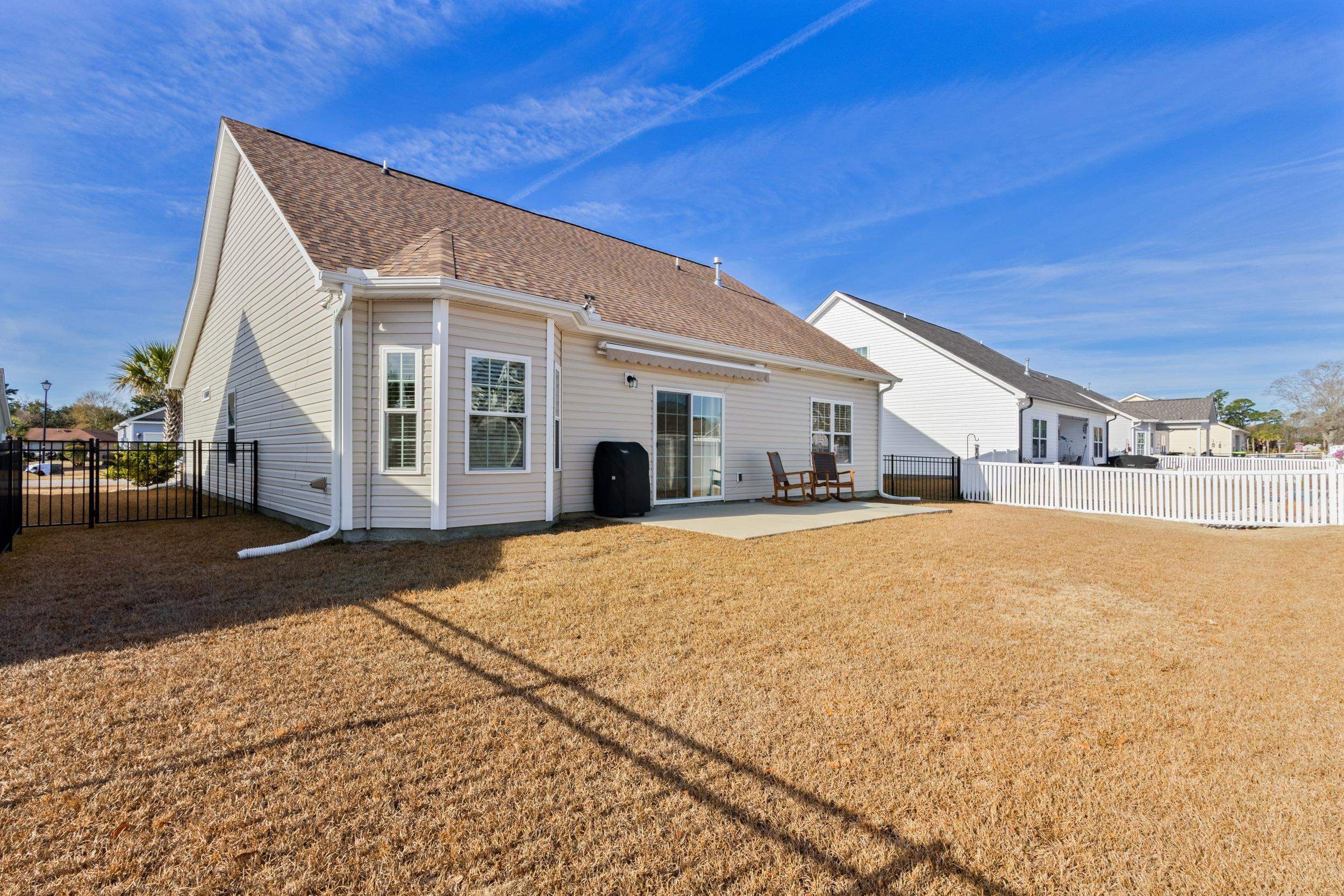 224 Obi Lane Surfside Beach, SC 29575 - Photo 21 of 24 Bathroom featuring double vanity and light tile patterned floors