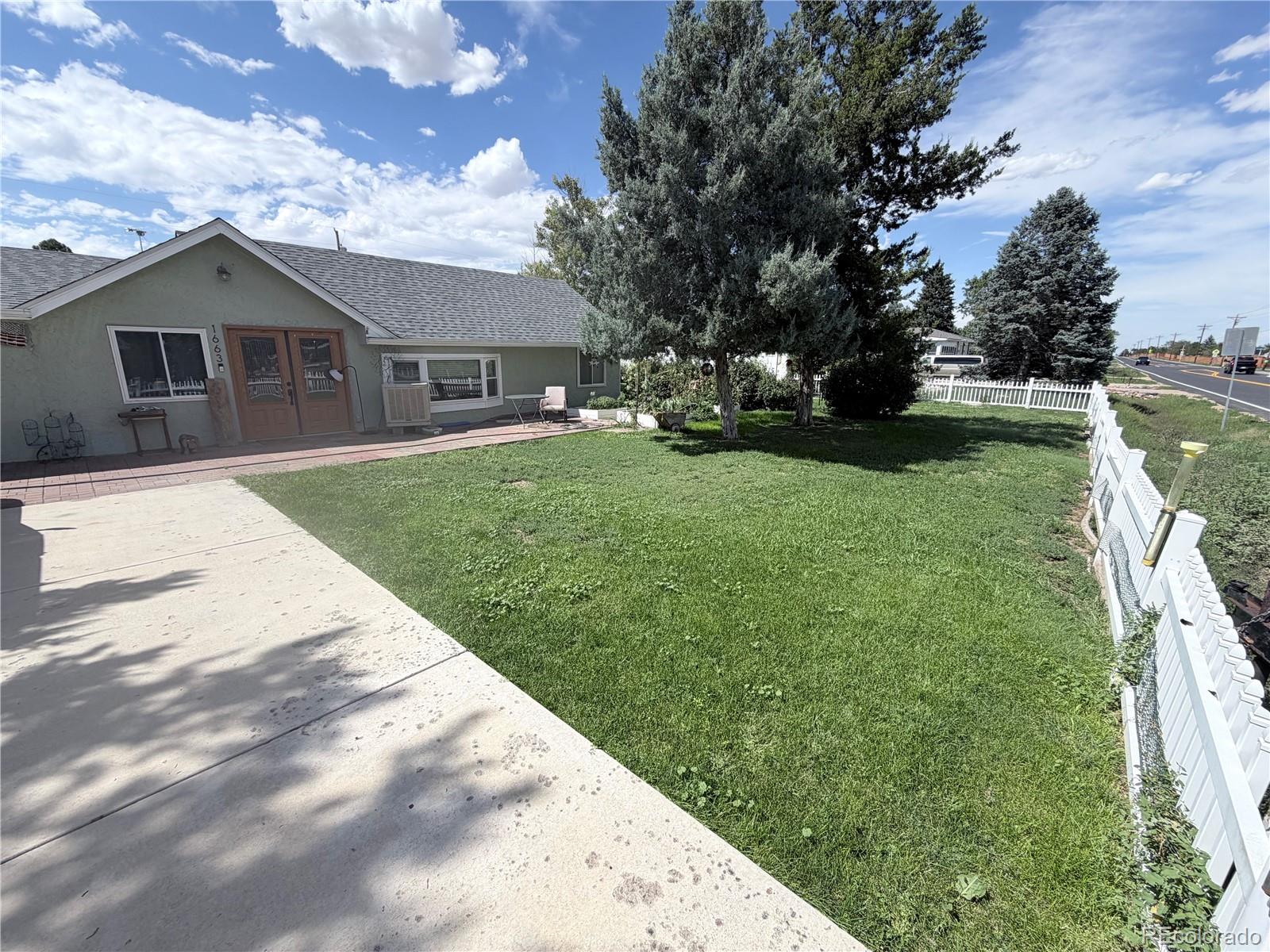 1663 Monroe Street Strasburg, CO 80136 - Photo 2 of 20 Gallery Image 2