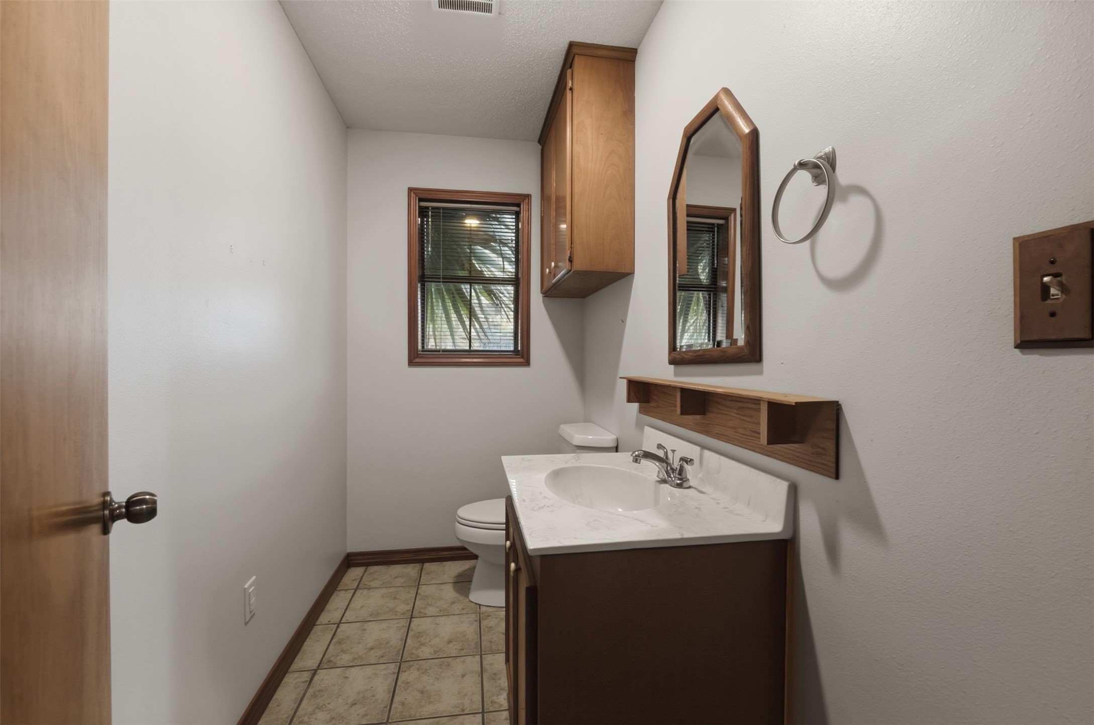 200 Cove View Drive Trinity, TX 75862 - Photo 18 of 39 a bathroom with a sink and a mirror