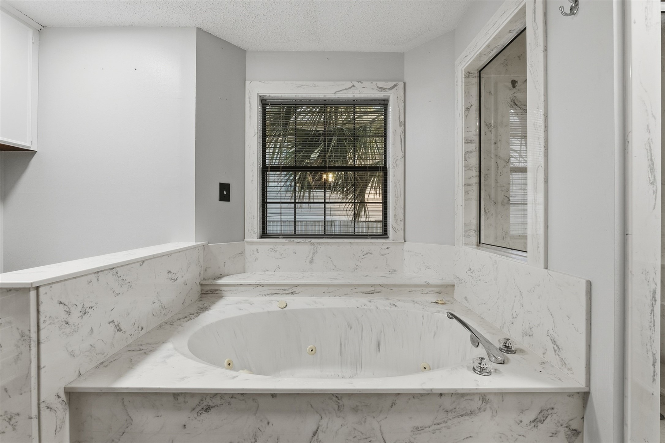 200 Cove View Drive Trinity, TX 75862 - Photo 21 of 39 a bathroom with bathtub and window