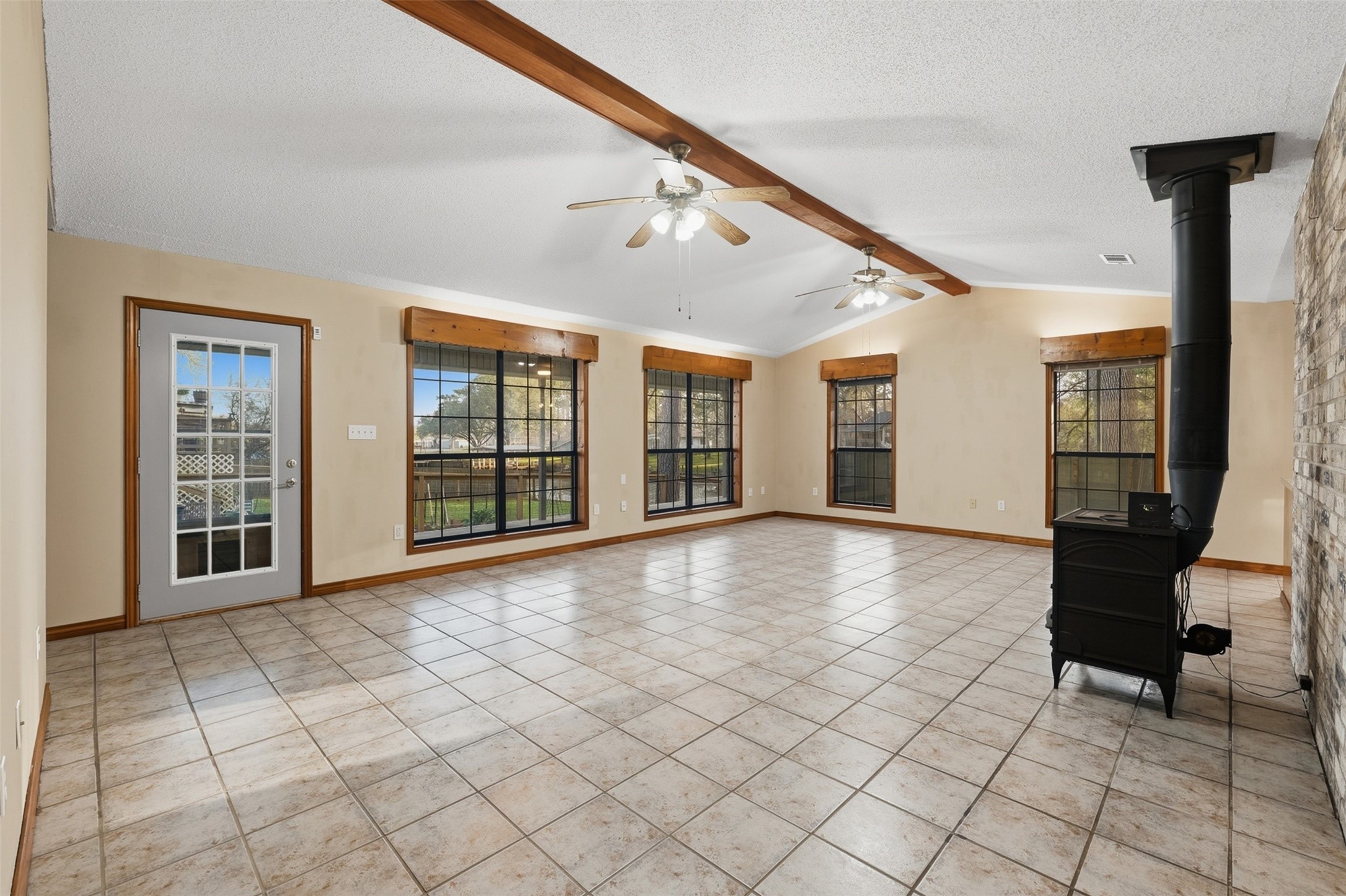 200 Cove View Drive Trinity, TX 75862 - Photo 10 of 39 a view of an entryway with wooden floor and windows