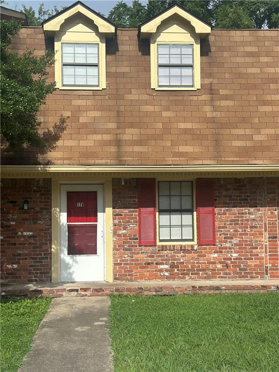 178 East 11th Street Southeast Rome, GA 30161 - Photo 1 of 1 a front view of a house with a yard