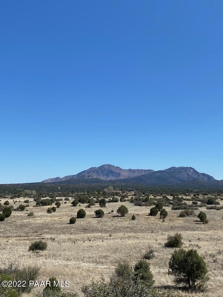 13600 North Pheasant Run Road Prescott, AZ 86305 - Photo 9 of 13 a view of a large mountain with sunset view