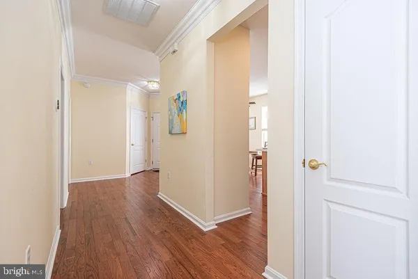 a bedroom with a bed and a mirror